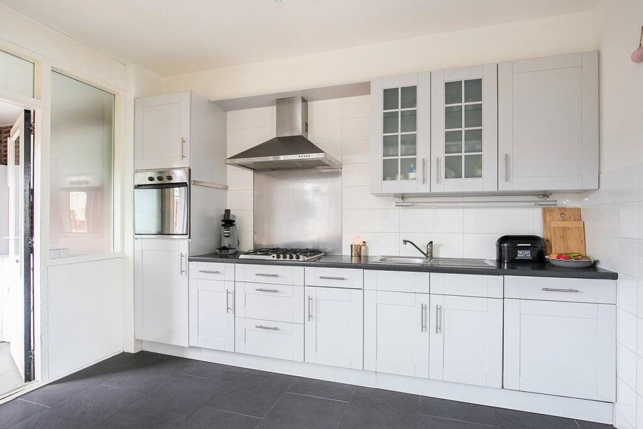 Tussenwoning met 3 slaapkamers en tuin - Afbeelding 2