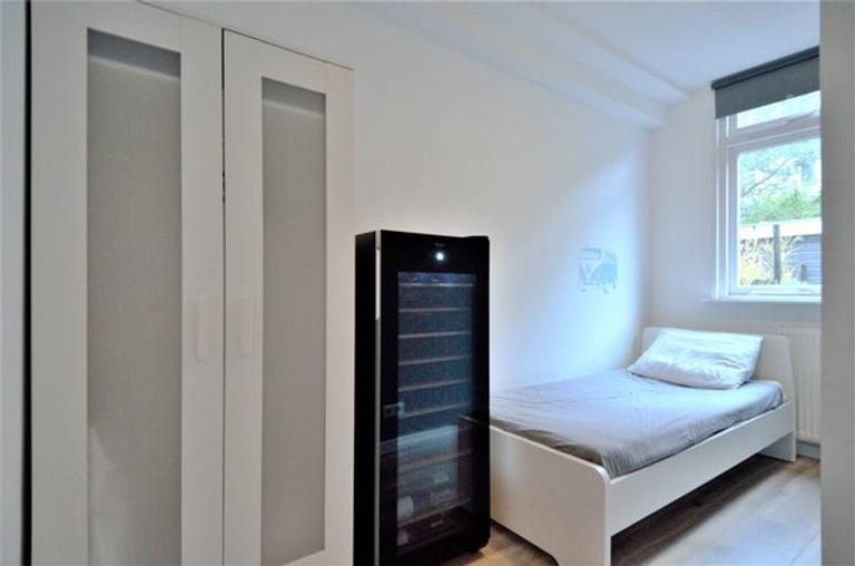 80 m² met zonnige tuin in Rivierenbuurt - Afbeelding 9